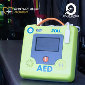 ZOLL AED, City of Oxford Logo and Oxford Health Systems Paramedics